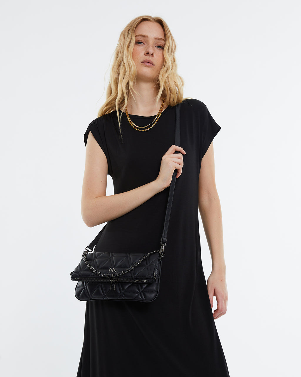 Small women's flap shoulder bag.