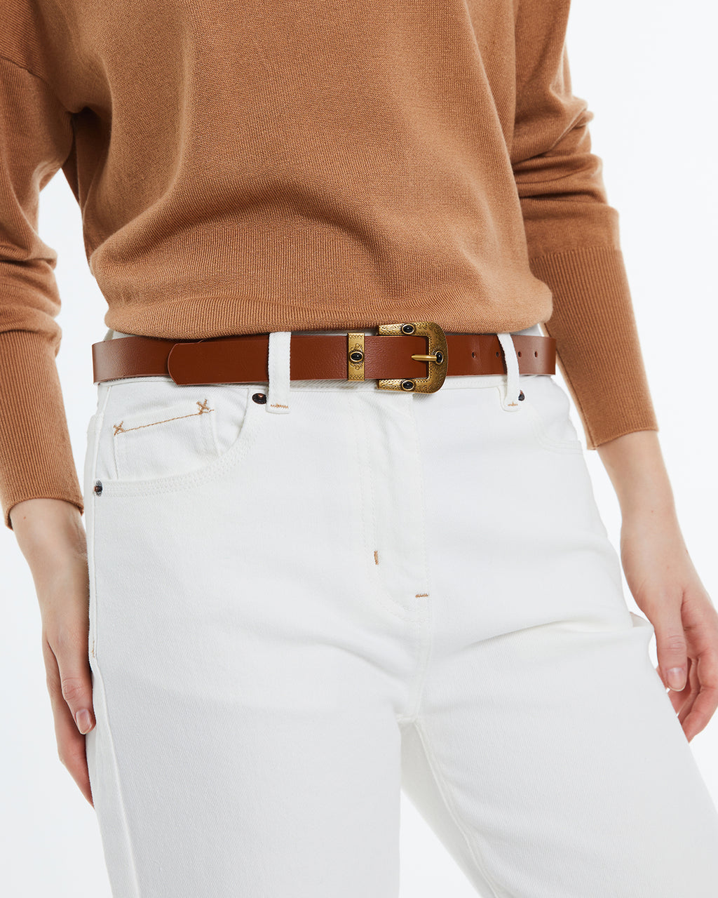 Women's belt with gold buckle.