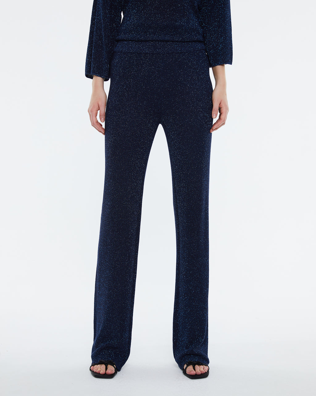 Straight women's trousers in lurex tricot knit, elastic waist.