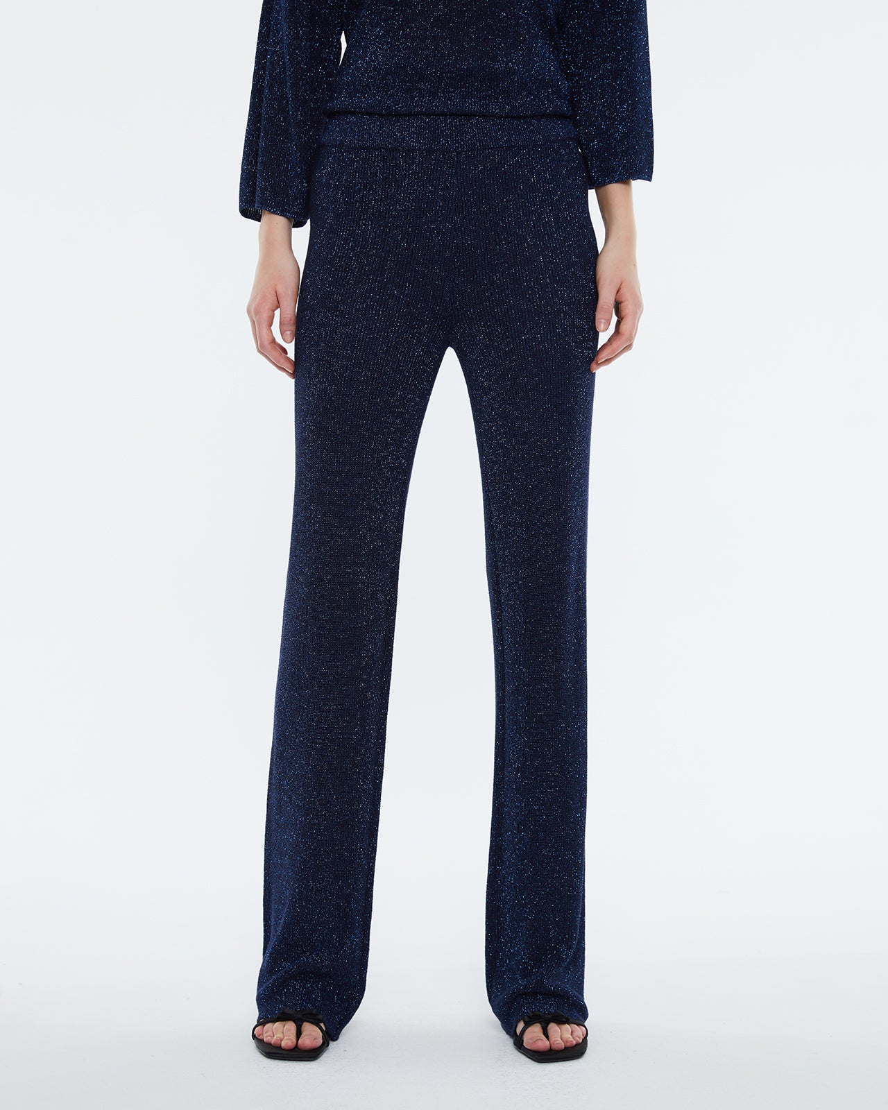 Straight women's trousers in lurex tricot knit, elastic waist.