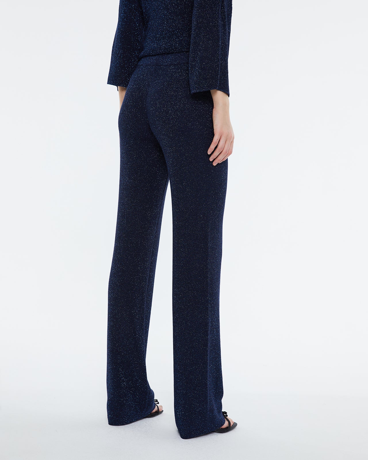 Straight women's trousers in lurex tricot knit, elastic waist.