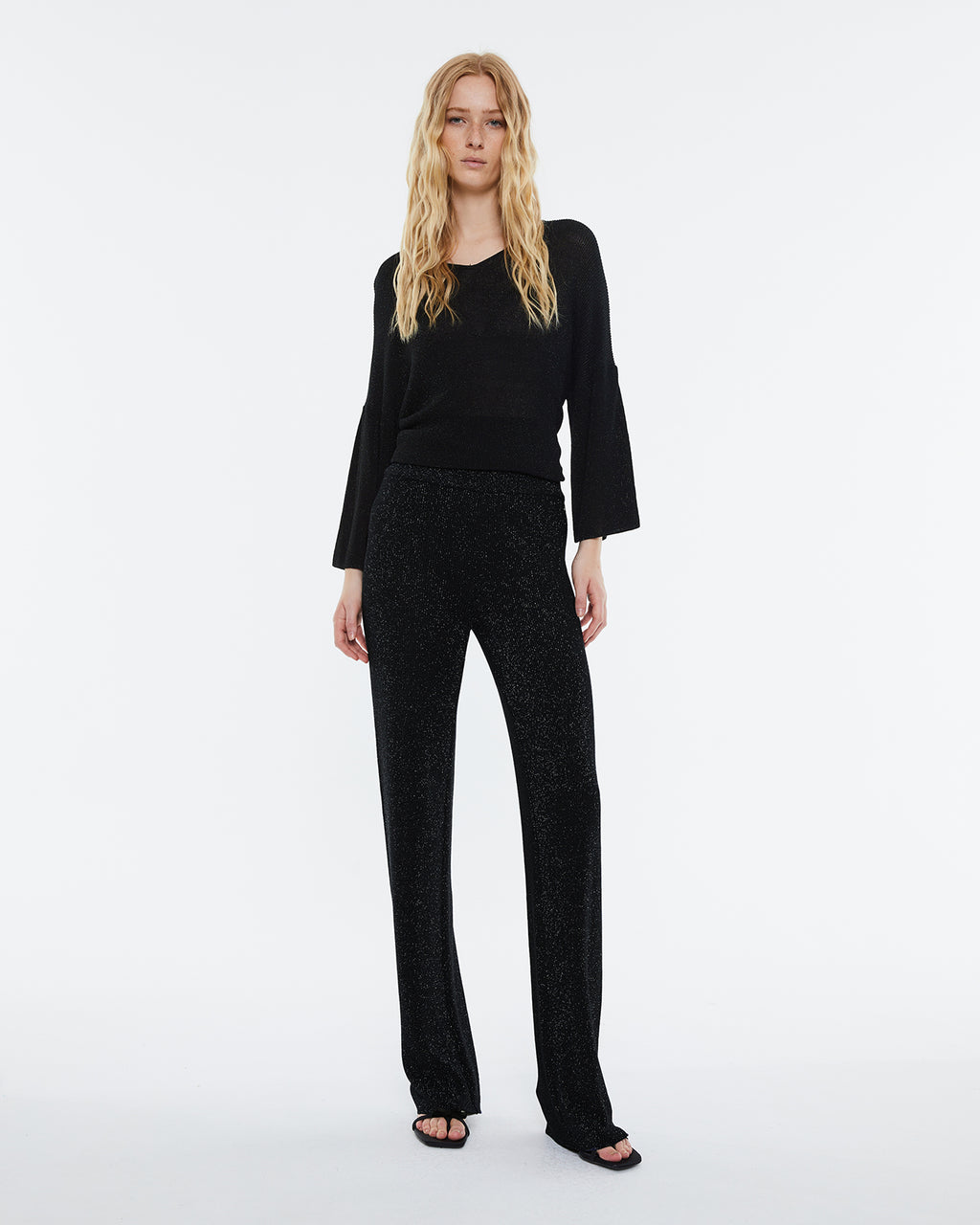 Straight women's trousers in lurex tricot knit, elastic waist.