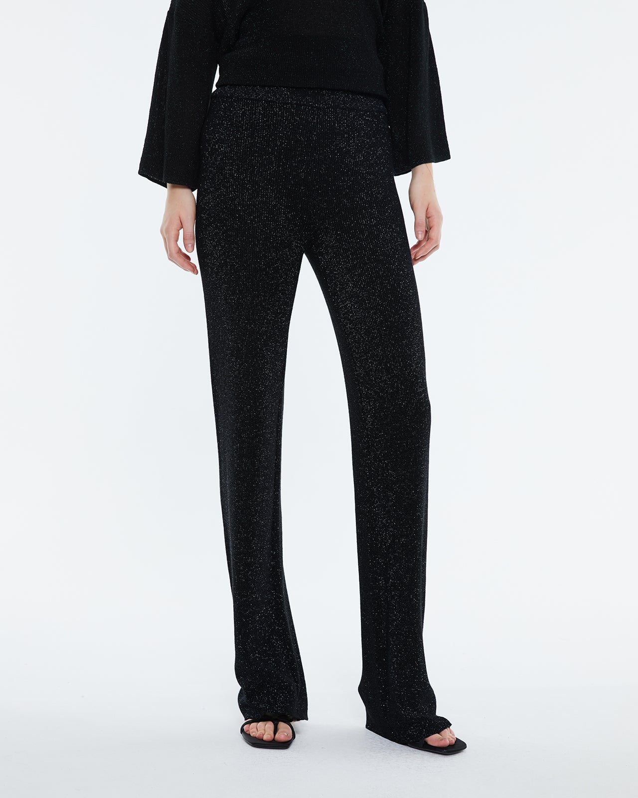 Straight women's trousers in lurex tricot knit, elastic waist.