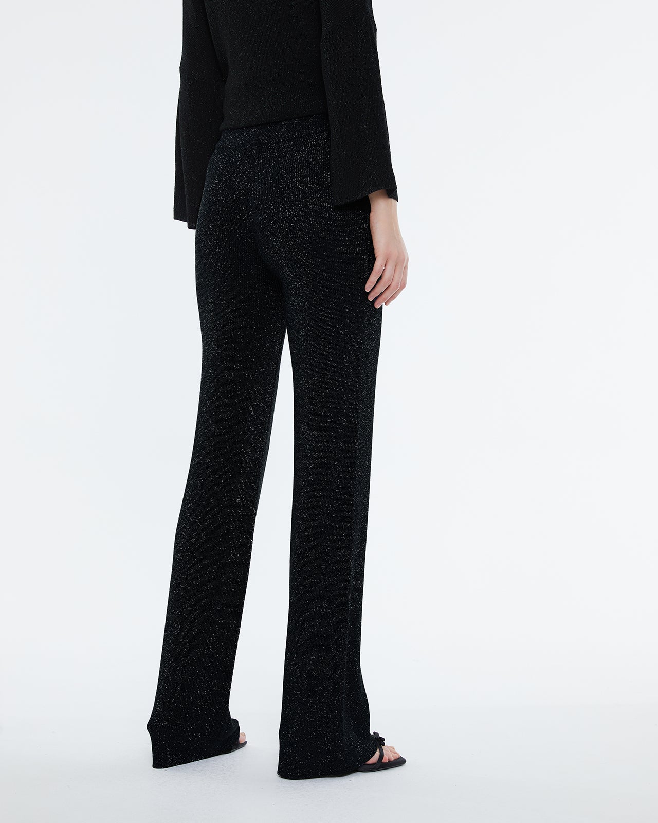 Straight women's trousers in lurex tricot knit, elastic waist.