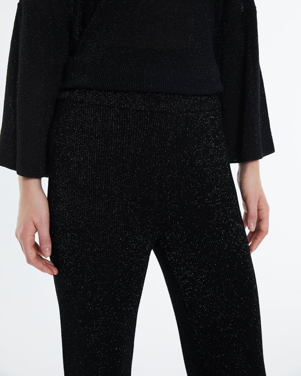 Straight women's trousers in lurex tricot knit, elastic waist.