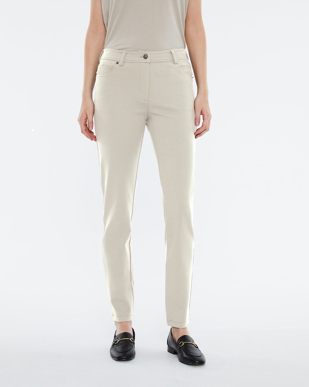 Women's skinny knit trousers, high waist, five pockets.