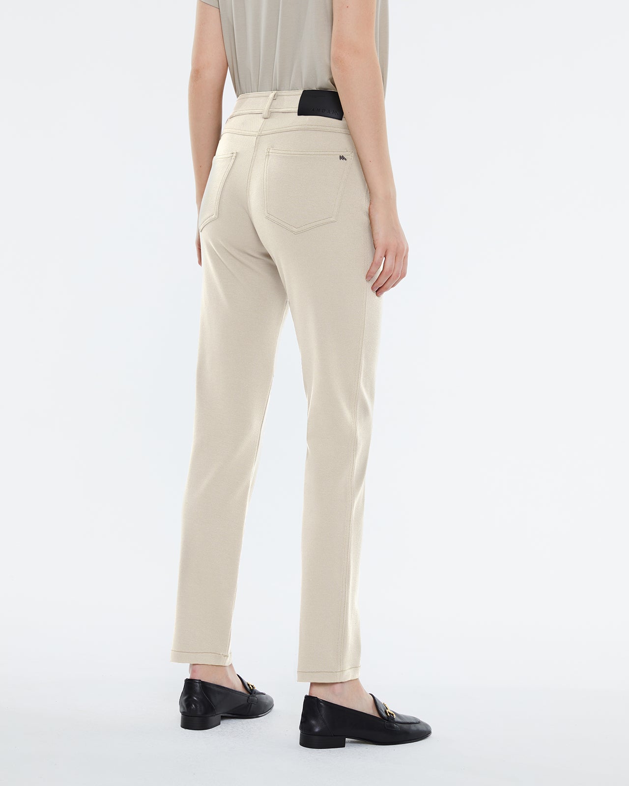 Women's skinny knit trousers, high waist, five pockets.