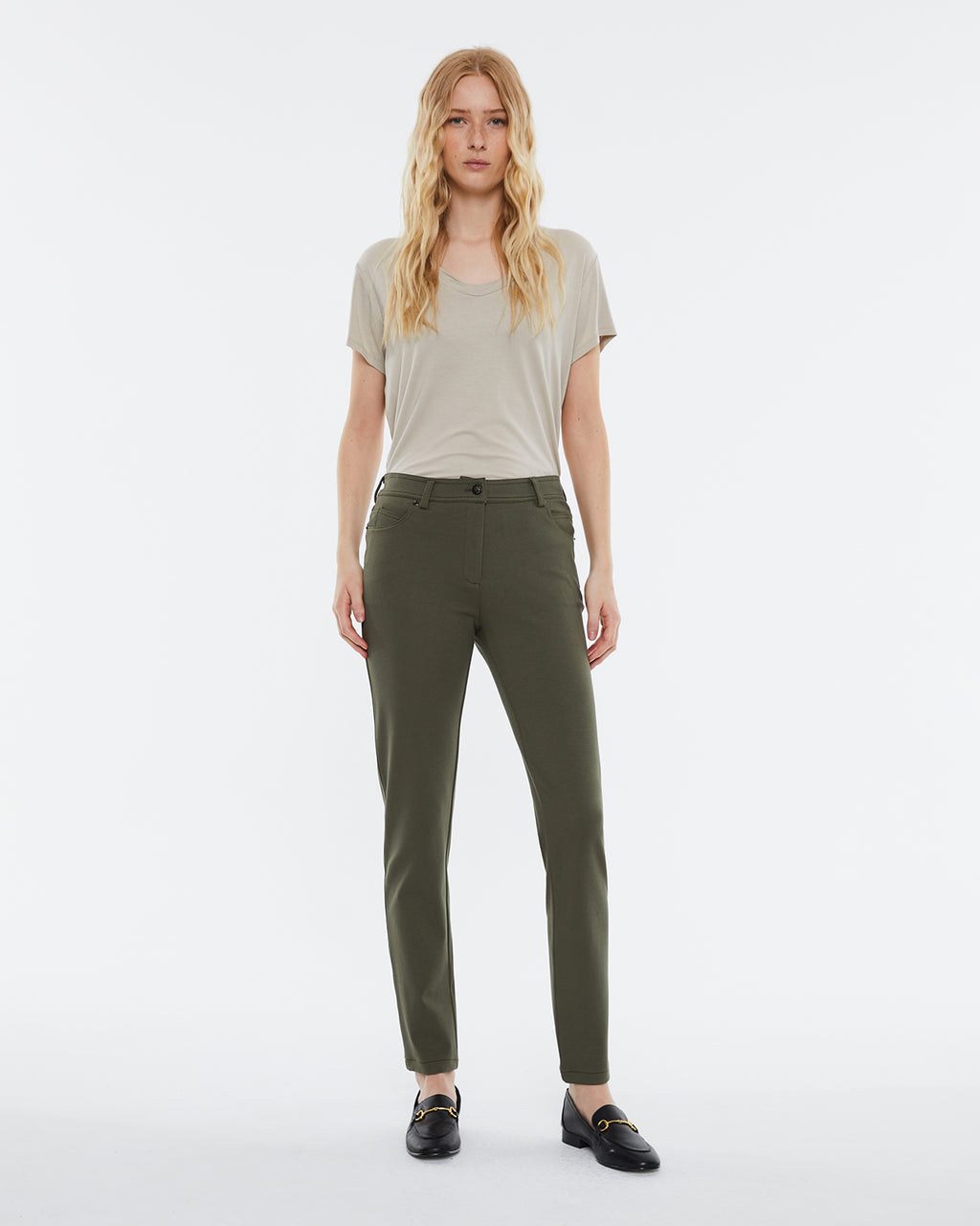 Women's skinny knit trousers, high waist, five pockets.