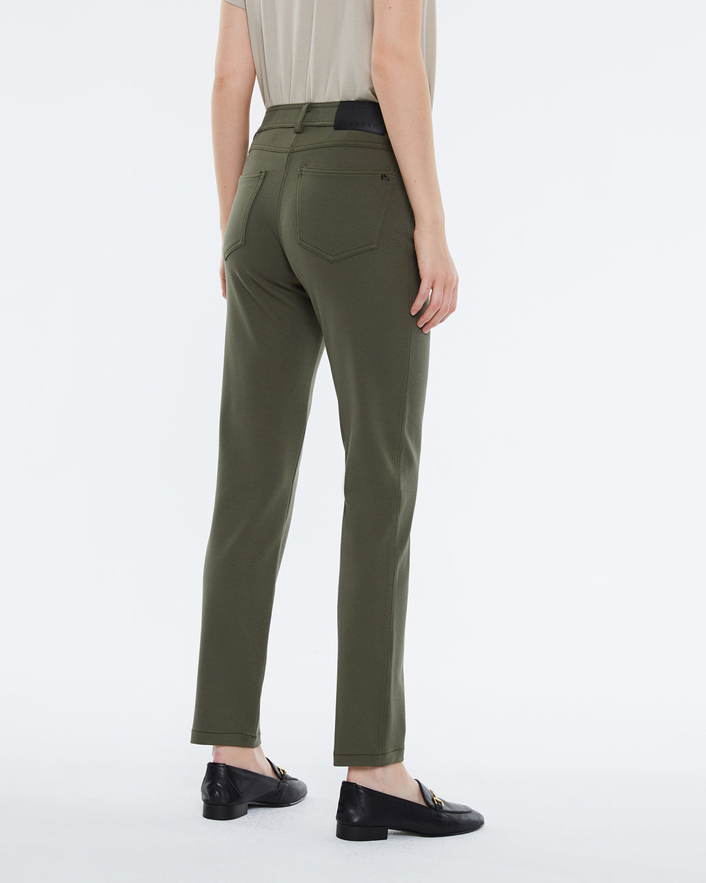 Women's skinny knit trousers, high waist, five pockets.