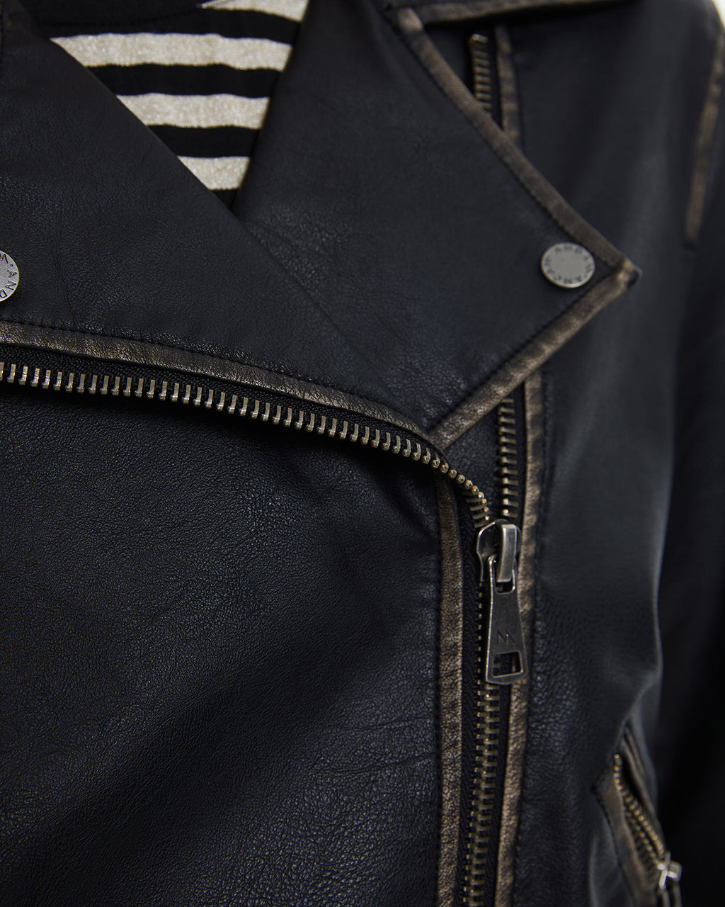 Women's biker jacket made of eco-leather. Lined.