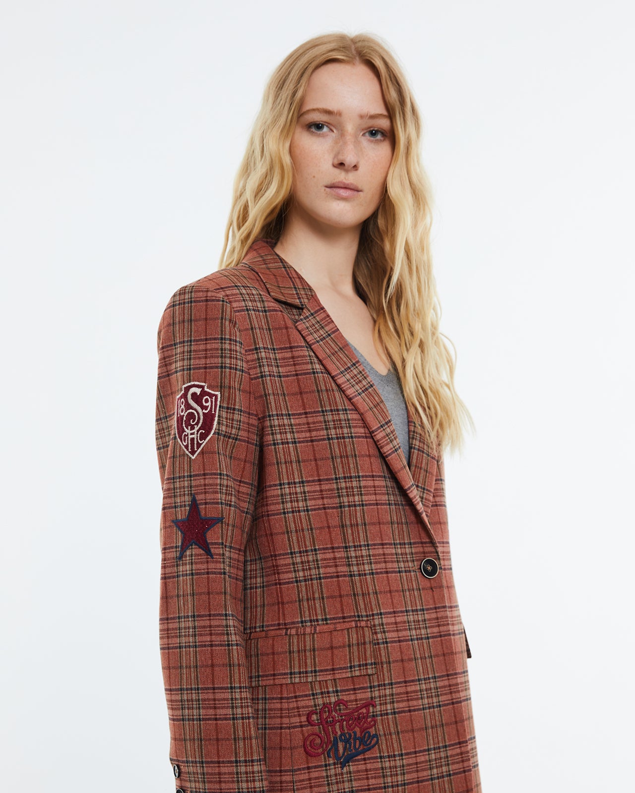 Women's checked print blazer. Lined.