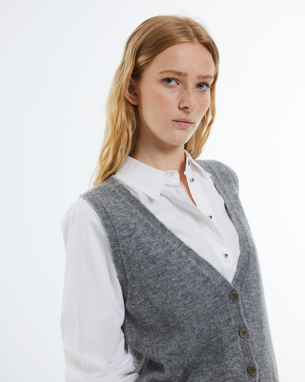 Women's vest in plain knit.