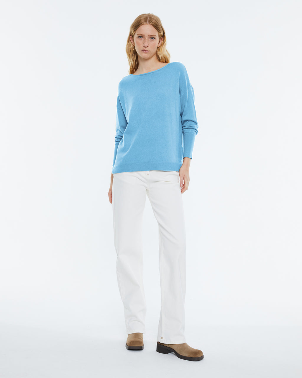 Women's boat neckline, long sleeve sweater.