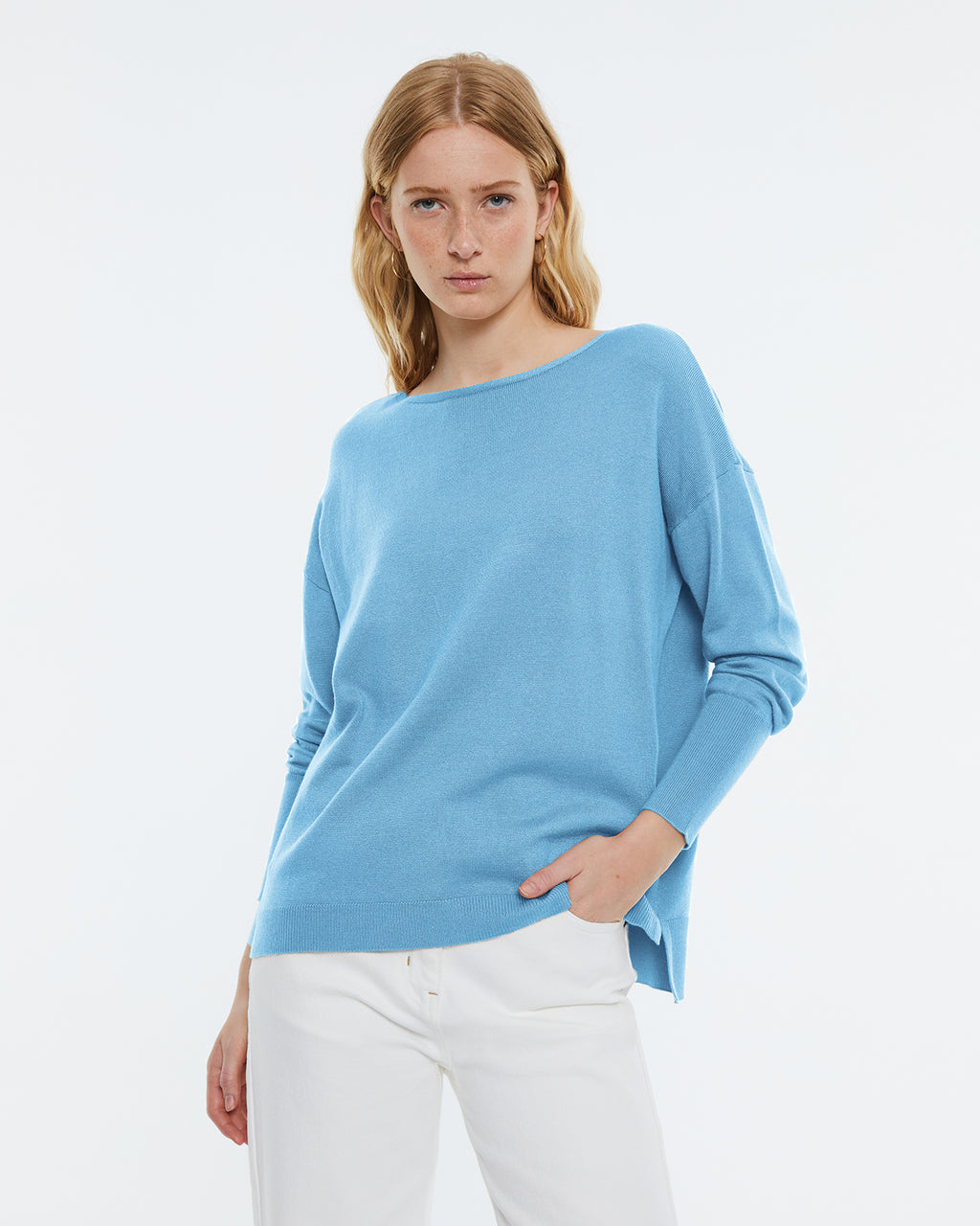 Women's boat neckline, long sleeve sweater.