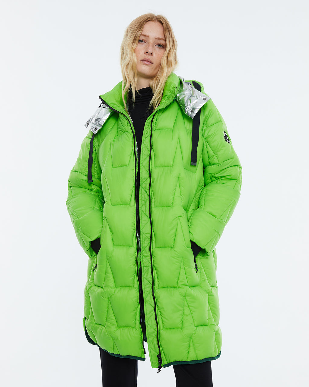 Long women's parka with removable hood. Lined.