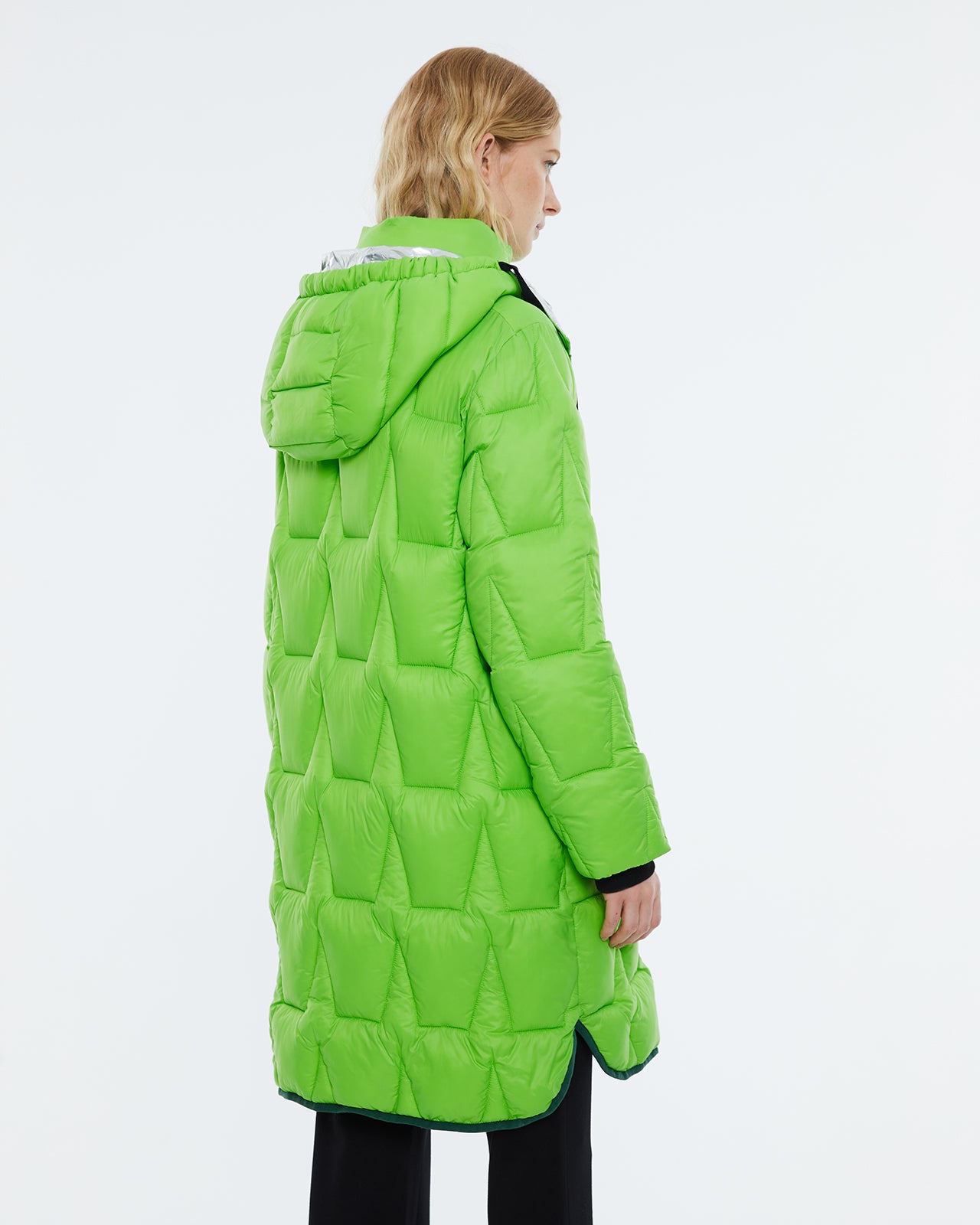 Long women's parka with removable hood. Lined.