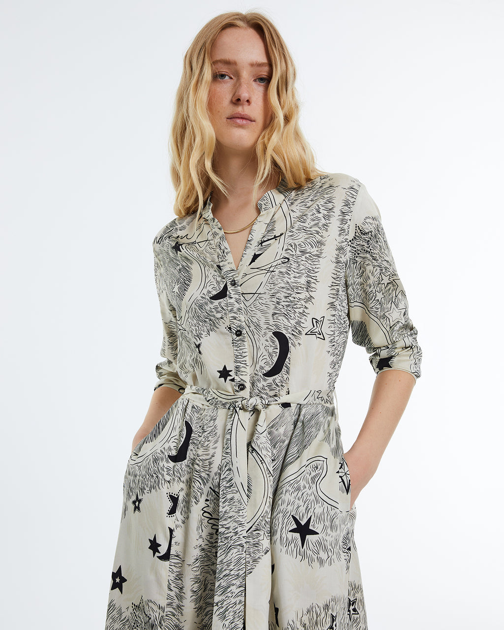 Long-sleeved printed midi dress.