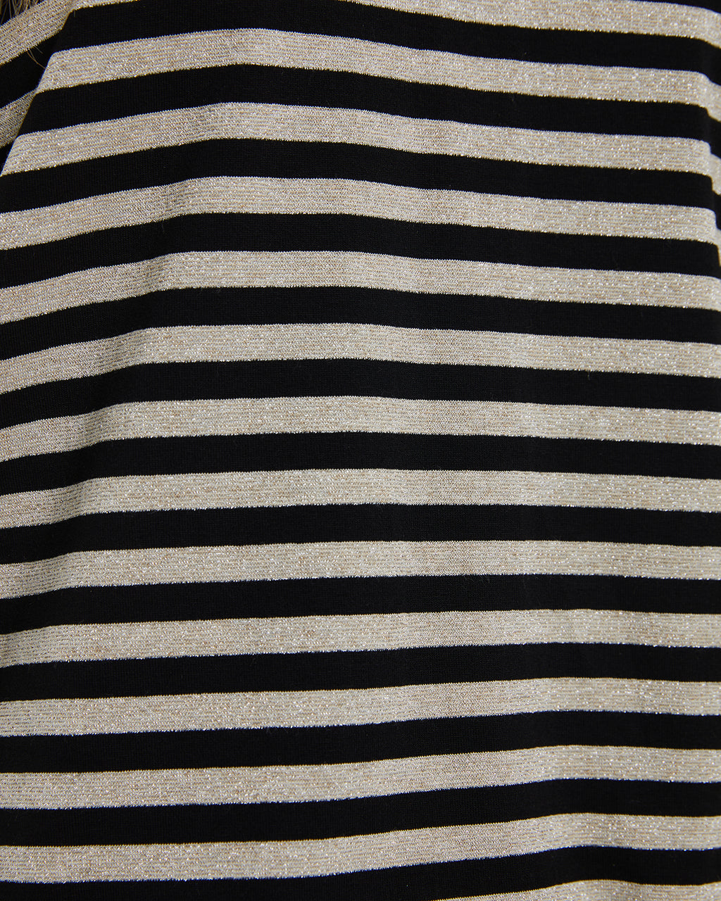 Women's striped print t-shirt with round neckline and long sleeves.