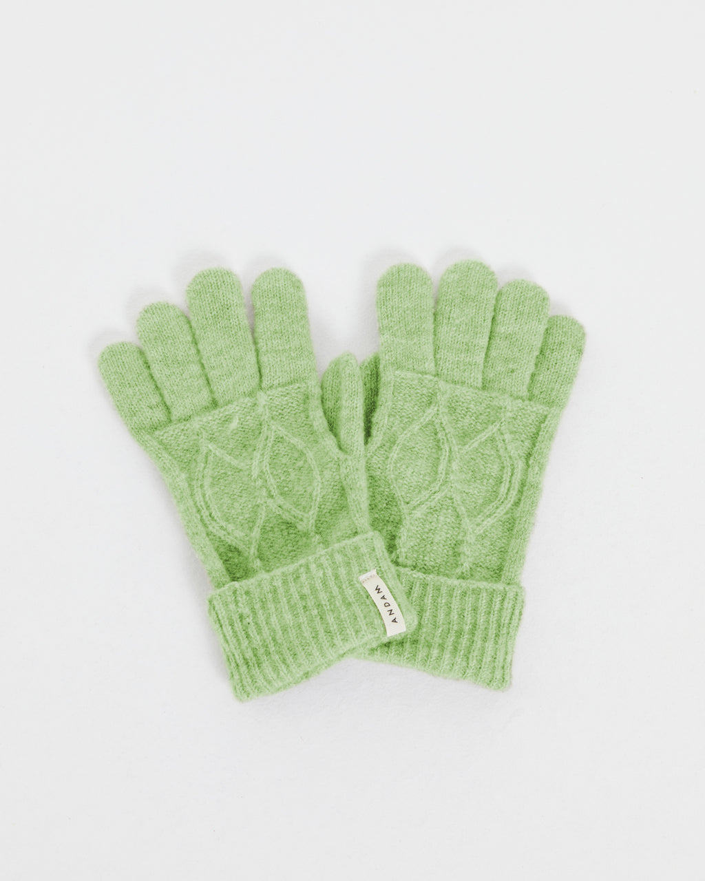 Women's knitted gloves with braided structure