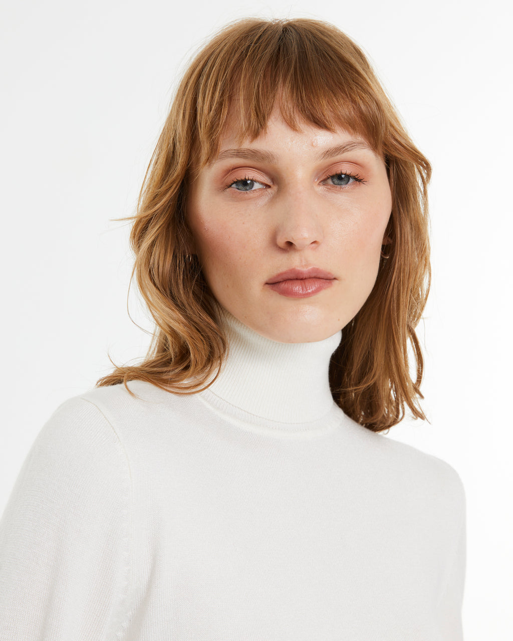 Jersey de mujer punto fino cuello vuelto