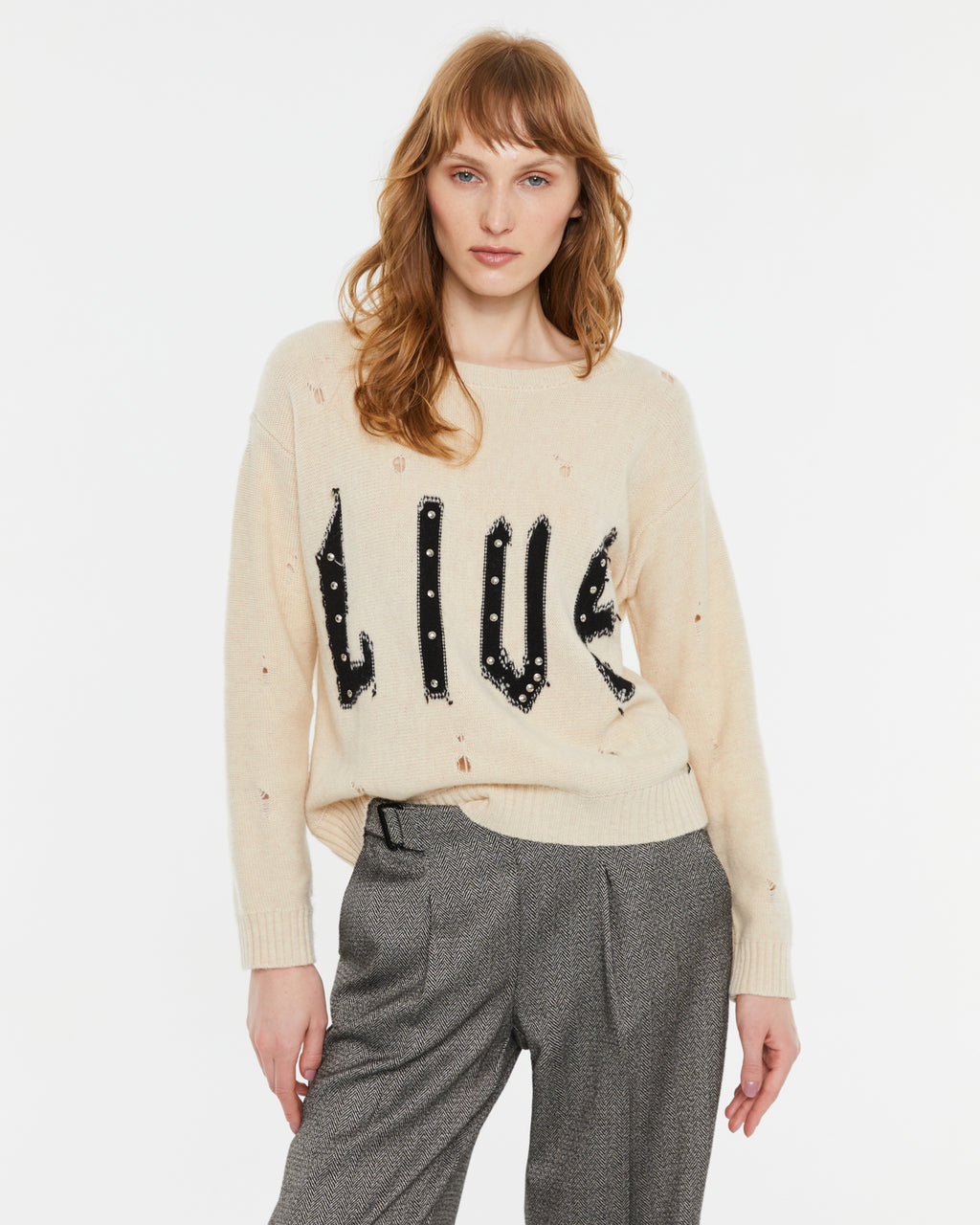Jersey de mujer cuello redondo tachas y rotos