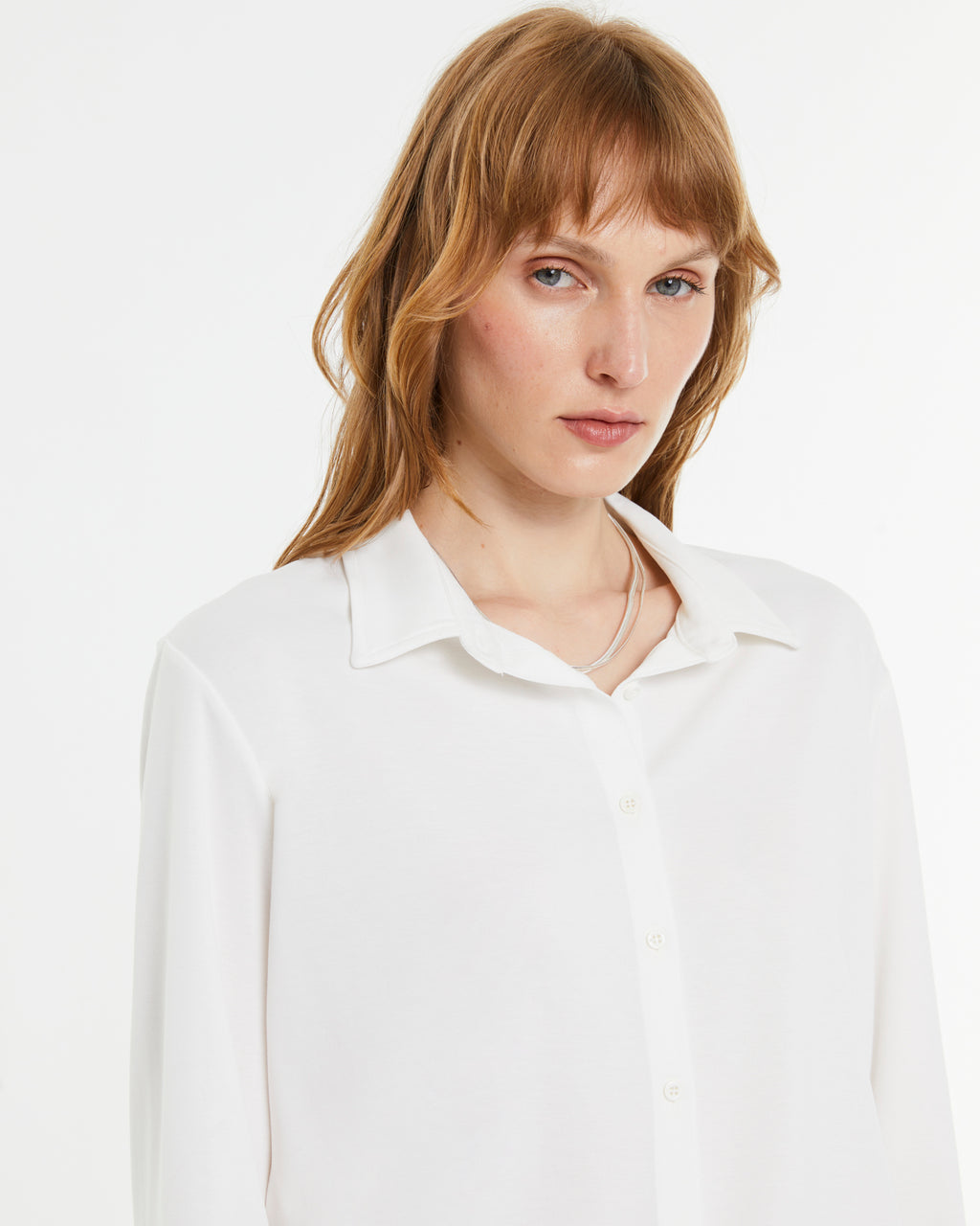 Camisa de mujer en punto liso