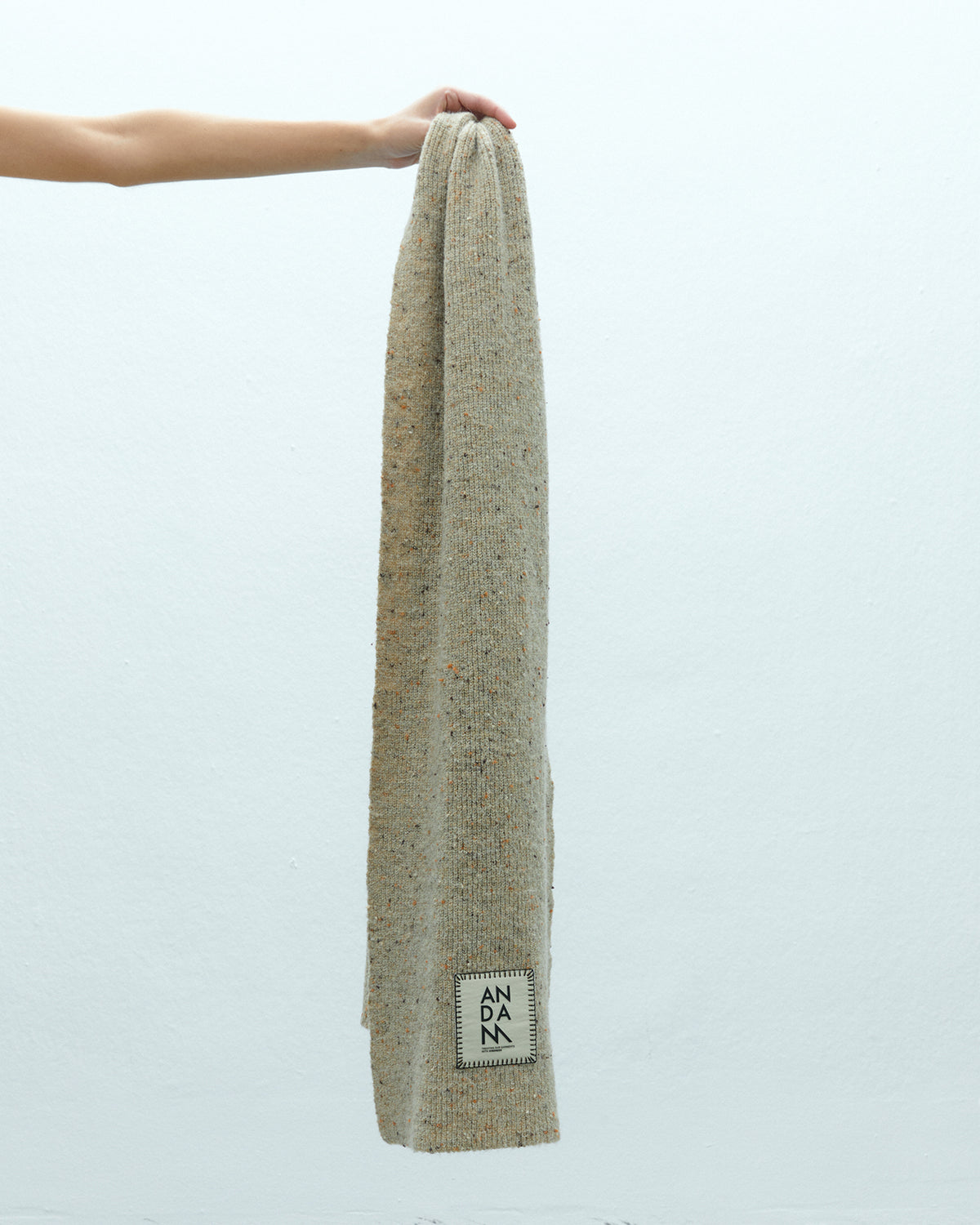 Bufanda de punto en tono beige jaspeado