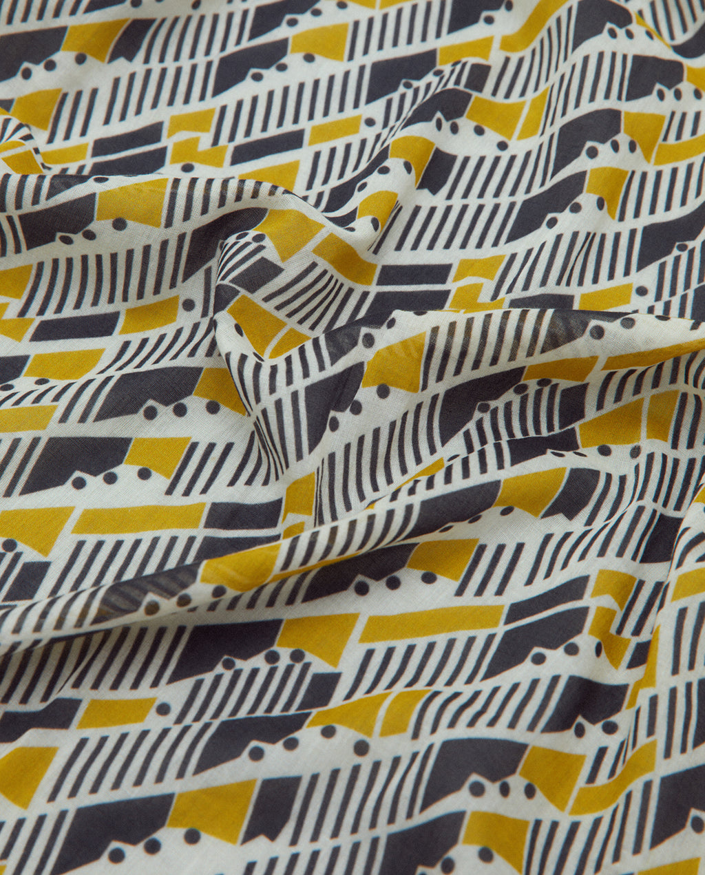 Fulard de algodón estampado geométrico.