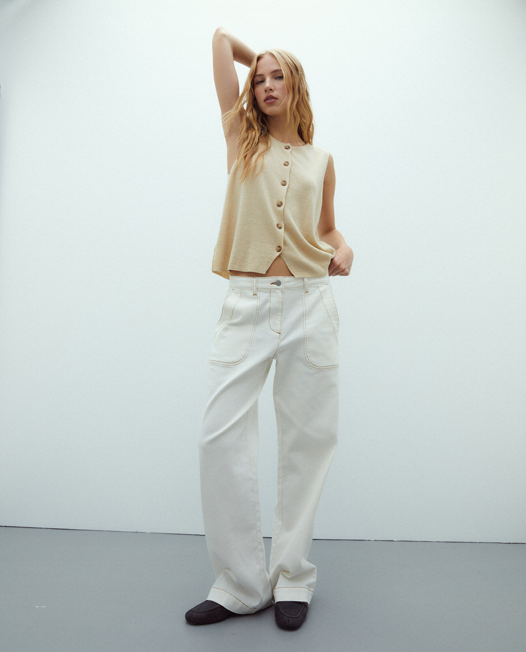 Chaleco de mujer en punto liso cuello redondo