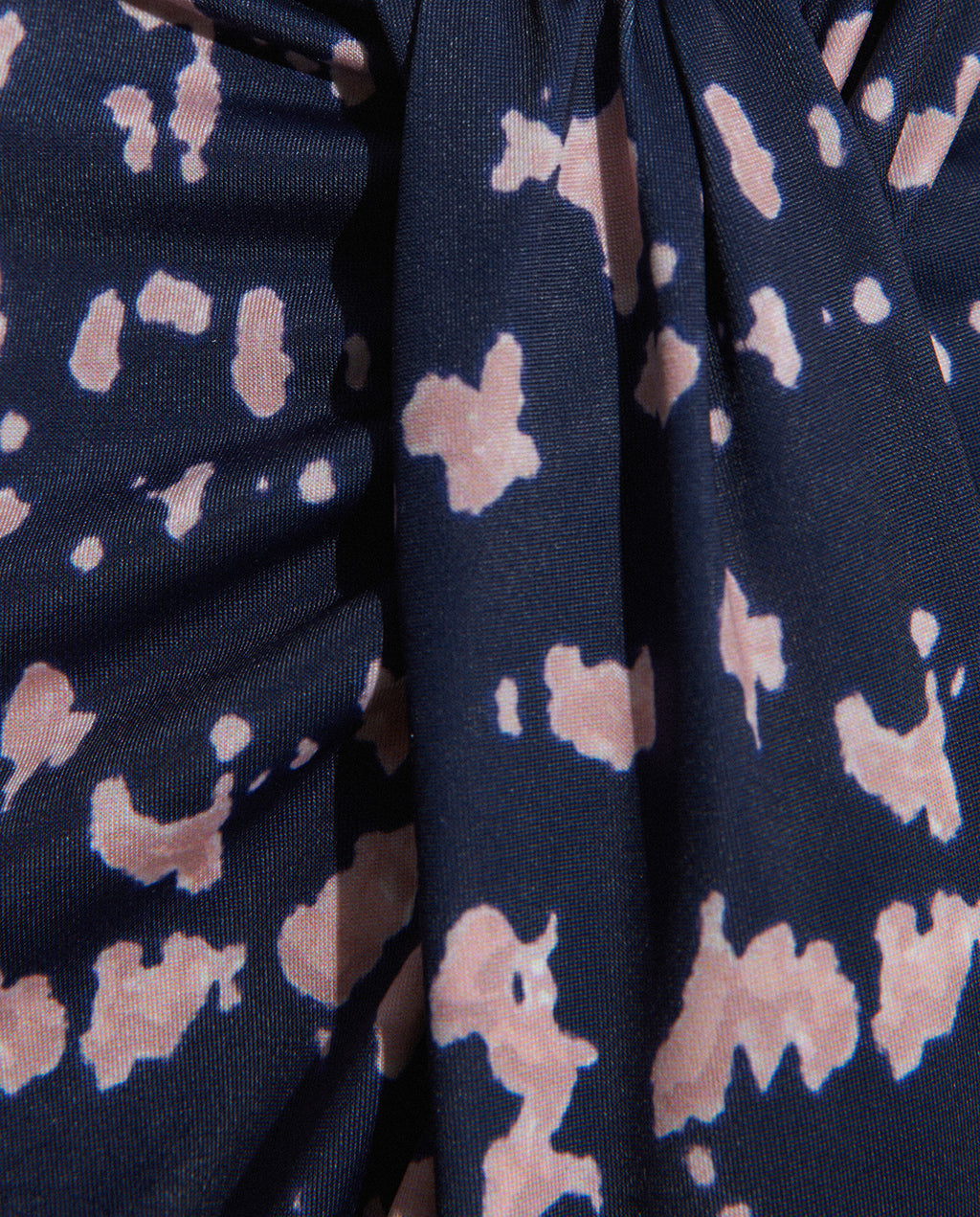 Camiseta de mujer asimétrica estampada