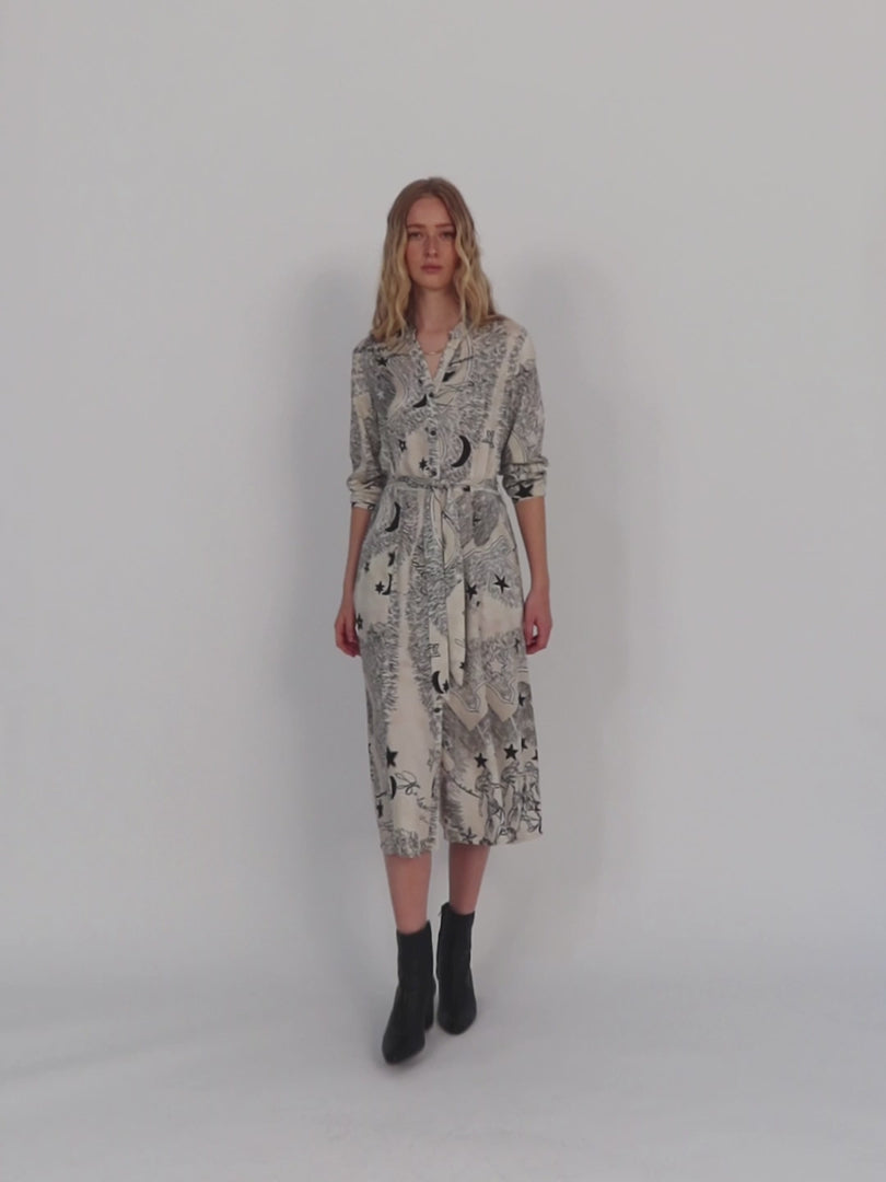 Long-sleeved printed midi dress.