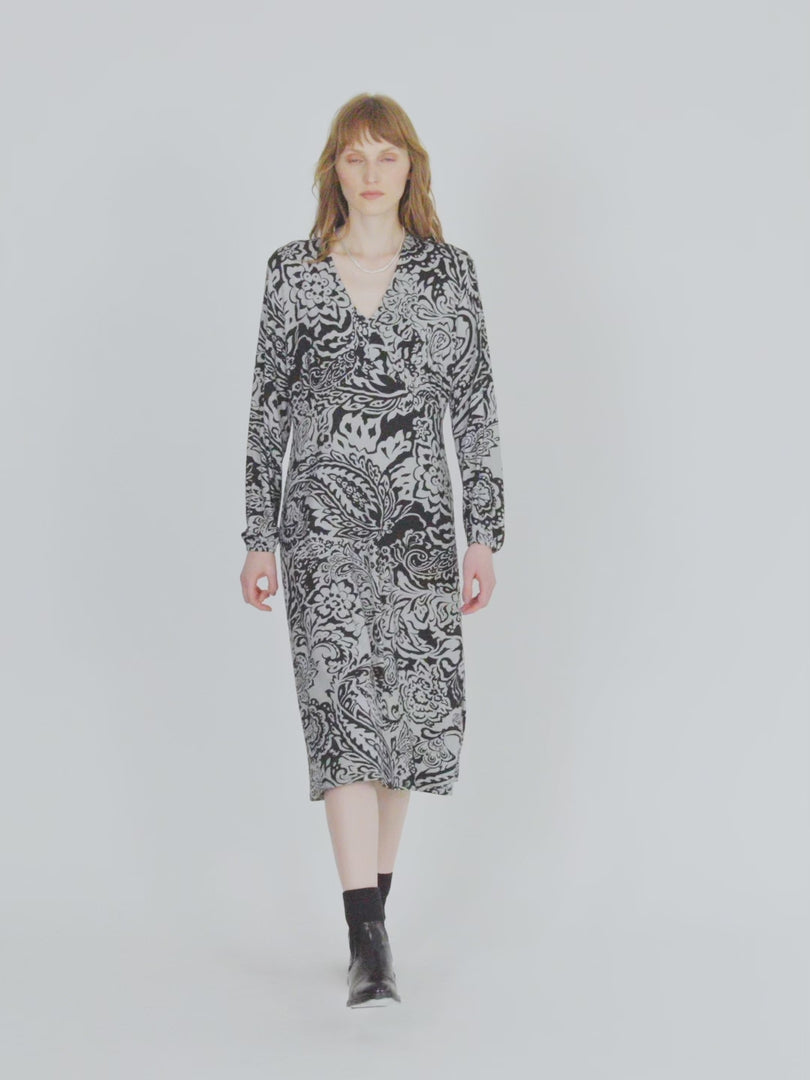 Vestido midi estampado de punto cuello pico