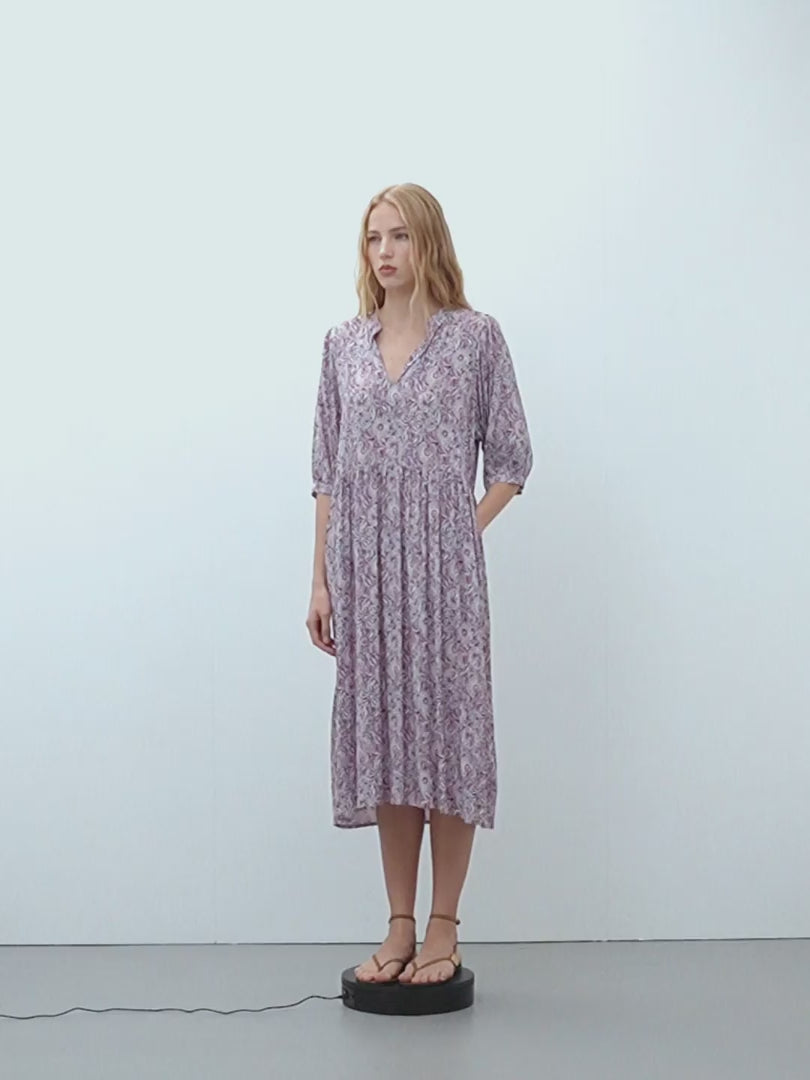 Vestido midi estampado cuello pico manga francesa